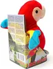 A plush parrot toy is shown sitting inside its packaging. Produktbild-Vorschau