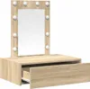 A vanity table with a mirror and an open drawer, against a white background. Náhled obrázku produktu