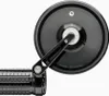 A close-up view of a motorcycle handlebar end mirror. Náhled obrázku produktu