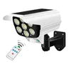 A white and black solar-powered outdoor security light with a remote control. Produktbild-Vorschau