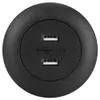 A close-up view of a black, circular USB charging port with two USB ports and the USB logo. Voir les images du produit