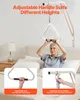An elderly woman is sitting in bed, holding onto a bed assist handle. Náhľad obrázku produktu