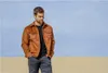 A man stands in a desert landscape. Produktbild-Vorschau