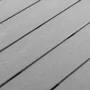A close-up view of a grey wooden table surface. Produktbild-Vorschau