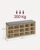 A wooden shoe bench with a gray cushion and 15 storage compartments. Dimensions and weight capacity are indicated. Produktbild-Vorschau