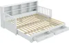 A white daybed with a bookcase headboard, slatted bed frame, and pull-out drawers, shown from a diagonal angle with the drawers extended. Náhled obrázku produktu