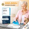 An elderly woman is ironing with a dog next to her. There are several certifications and customer reviews displayed. Produktbild-Vorschau