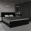 A bedroom scene with a black bed. Voir les images du produit