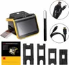 A product shot of a film scanner and its accessories, laid out on a white background. Podgląd zdjęcia produktu