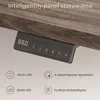 A close-up view of the underside of a wooden desk, showing a control panel with a digital display and buttons. Below the desk are icons and text describing its features. Podgląd zdjęcia produktu