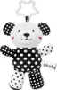 A black and white teddy bear toy with a star-shaped clip for hanging. Náhľad obrázku produktu