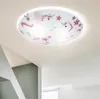 A ceiling light fixture with a unicorn and star pattern is mounted on a white ceiling, with a corner of a wall visible below. Produktbild-Vorschau