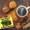 A metal sign with a warning symbol and text, placed next to cookies and coffee. Produktbild-Vorschau