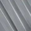 A close-up, abstract view of a gray fabric with pleats or folds. Produktbild-Vorschau