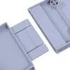 Close-up view of two interlocking plastic components, likely parts of a rotating tray or organizer. Náhled obrázku produktu