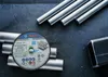 A cutting disc and metal rods on a dark surface. Produktbild-Vorschau