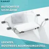 A bath seat is placed inside a bathtub, with a towel draped over the edge. Náhled obrázku produktu