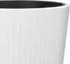 A close-up view of the textured, ribbed surface of a white planter. Náhled obrázku produktu