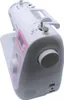 A close-up, angled view of a white Brother sewing machine with pink accents. Produktbild-Vorschau