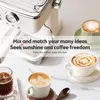 A coffee machine with cups of coffee on a marble countertop. Produktbild-Vorschau