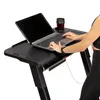 A person is using a laptop on a treadmill desk. Podgląd zdjęcia produktu