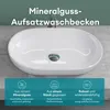 A white mineral cast countertop washbasin is shown from a slightly elevated angle, with text overlays highlighting its features. Produktbild-Vorschau