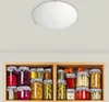 A ceiling light fixture is shown above a shelf filled with jars of preserved food. Produktbild-Vorschau