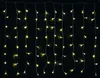 A string of warm white LED lights hanging vertically against a black background. Náhľad obrázku produktu