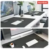 Two split images showing a desk setup with a dark gray desk mat, computer, keyboard, and mouse. Anteprima dell’immagine prodotto