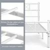 Close-up views of a white metal bed frame assembly, showing how to connect the slats. Podgląd zdjęcia produktu
