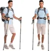Two men wearing hiking gear and holding trekking poles, presented against a white background. Produktbild-Vorschau