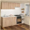 A modern kitchen with light wood cabinets, white subway tile backsplash, and stainless steel appliances. Anteprima dell’immagine prodotto