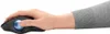 A hand using a black trackball mouse with a blue trackball. Anteprima dell’immagine prodotto