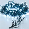 A close-up shot of a string of white LED lights coiled on a white surface. Anteprima dell’immagine prodotto