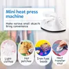 A collage of images showcasing a mini heat press machine and its various applications. Produktbild-Vorschau