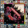 A Monopoly board game with a 'The Walking Dead' theme, featuring zombie illustrations and game elements. Náhled obrázku produktu