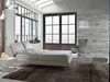 A bedroom scene with a bed, chair, and bench. Náhled obrázku produktu