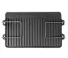 A top-down view of a black cast iron grill plate with two silver handles. Produktbild-Vorschau