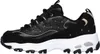 A side view of a black Skechers sneaker with gold accents and a white sole. Voir les images du produit