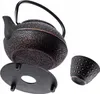 A black cast iron teapot with a bronze speckled pattern, a matching cup, and a black trivet are displayed against a white background. Podgląd zdjęcia produktu