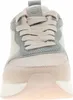 A close-up front view of a beige and gray sneaker. Voir les images du produit
