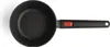 A top-down view of a black saucepan with a black handle and a red accent on the handle, set against a white background. Produktbild-Vorschau