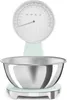 A Smeg electronic kitchen scale with a stainless steel bowl, shown from the front on a white background. Voir les images du produit