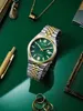 A watch and accessories are arranged on a green surface. Voir les images du produit