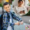 A young boy wearing a backpack and a smartwatch, with a woman in the background looking at her phone. The smartwatch displays a GPS tracking interface. Náhled obrázku produktu