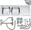 A stainless steel double kitchen sink with drainboard and plumbing accessories laid out below. Podgląd zdjęcia produktu
