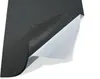 A close-up view of a piece of black insulation material with a silver backing, partially peeled back to reveal a white protective layer. Produktbild-Vorschau