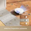 A robot vacuum cleaner is shown cleaning a floor, with a graphic overlay illustrating its suction power on different surfaces. Produktbild-Vorschau
