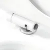 A close-up view of a toilet seat hinge mechanism. Podgląd zdjęcia produktu