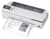 A white Epson plotter printer is shown from a diagonal front view, printing a document that includes architectural plans and an image of a building. Produktbild-Vorschau